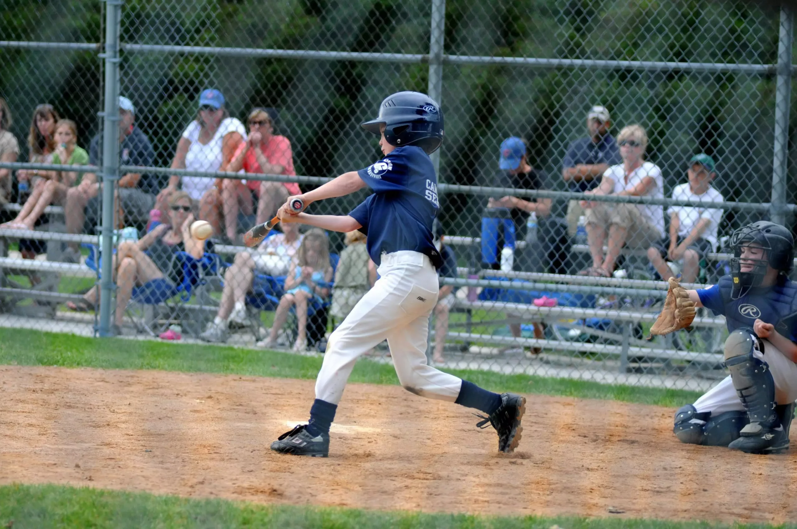 The Ongoing Debate: Metal vs. Wood Bats in Youth Baseball